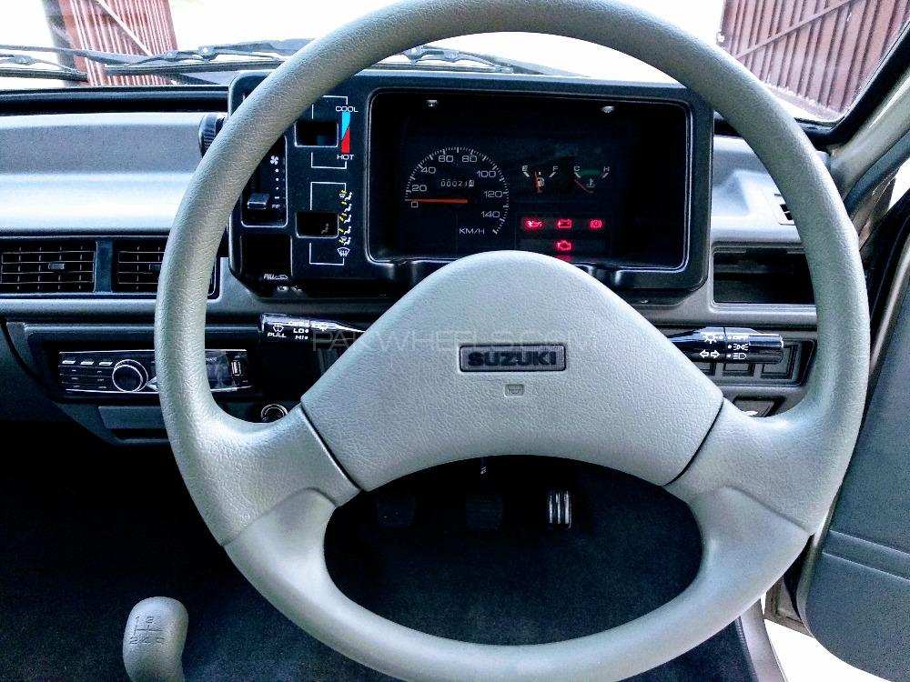 Suzuki Mehran 2019 for Sale in Faisalabad Suzuki Mehran 2019 for Sale in Faisalabad Image-15