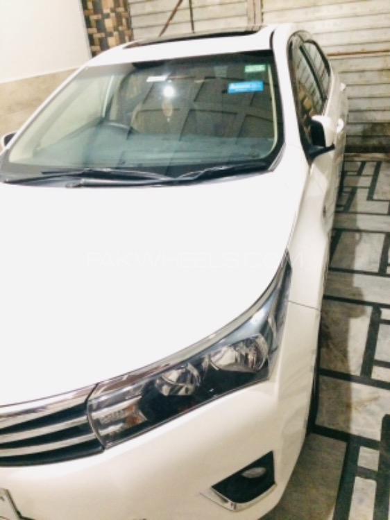 Toyota Corolla 2014 for Sale in Peshawar Toyota Corolla 2014 for Sale in Peshawar Image-4