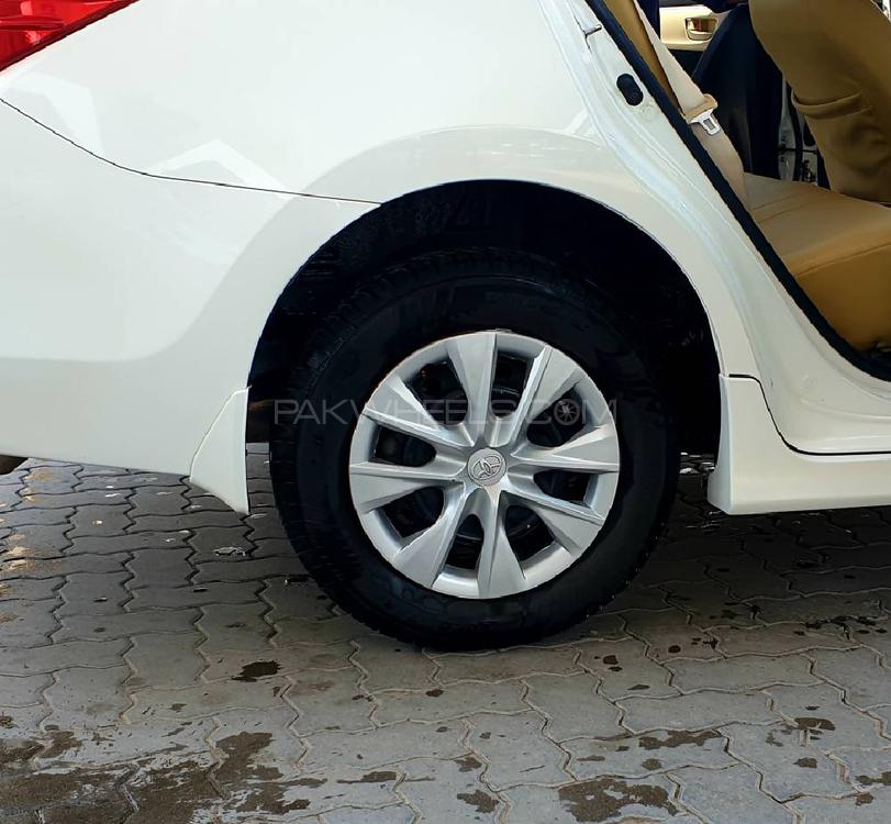 Corolla Gli Genuine Rims & Original Wheel Covers/Cups Image-1