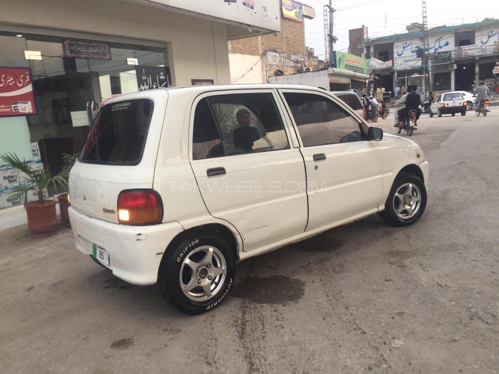 Daihatsu Cuore 2004 for Sale in Peshawar Daihatsu Cuore 2004 for Sale in Peshawar Image-4