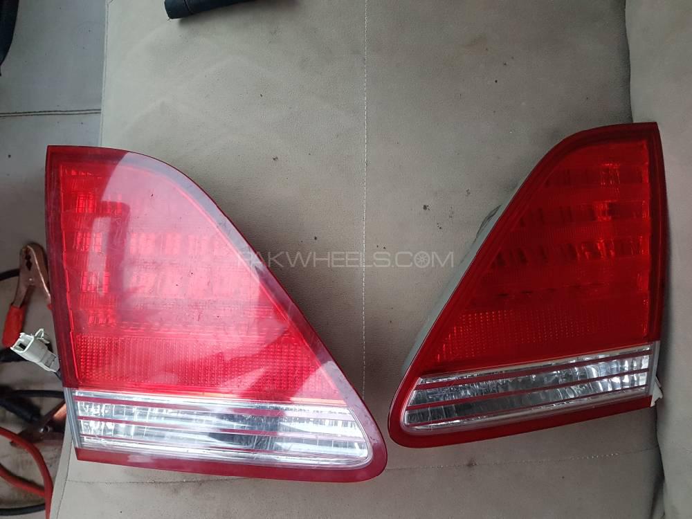 Toyota Crown 2005 back trunk lights pair for sale (genuine) Image-1