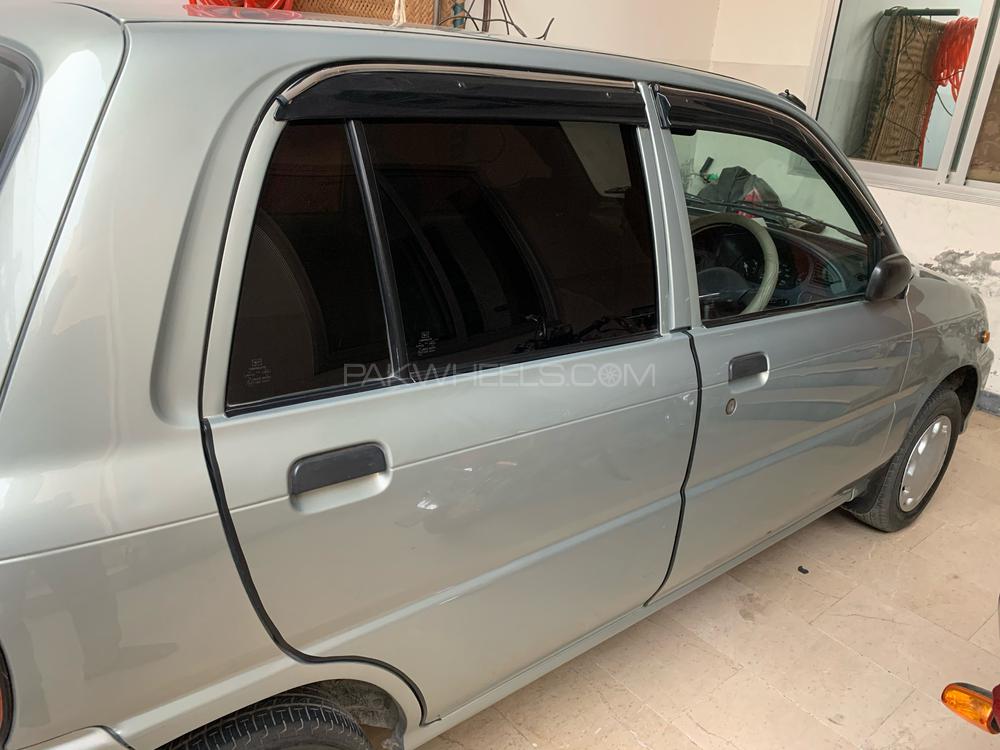 Daihatsu Cuore 2012 for Sale in Faisalabad Image-1
