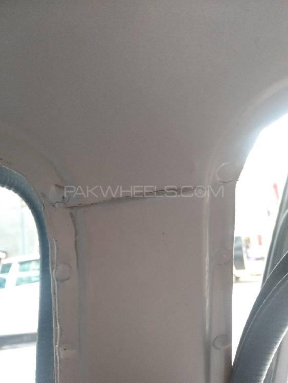 Daihatsu Cuore 2007 for Sale in Peshawar Daihatsu Cuore 2007 for Sale in Peshawar Image-13