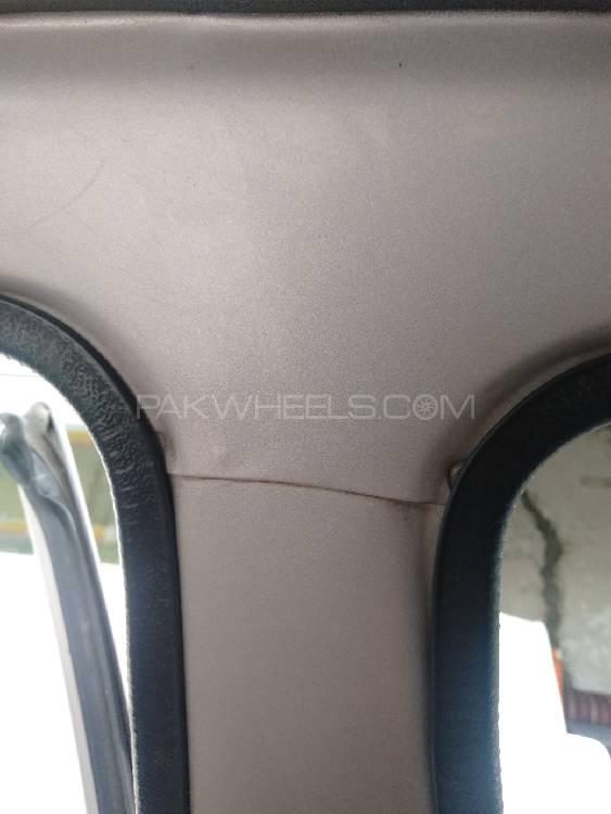Daihatsu Cuore 2007 for Sale in Peshawar Daihatsu Cuore 2007 for Sale in Peshawar Image-14
