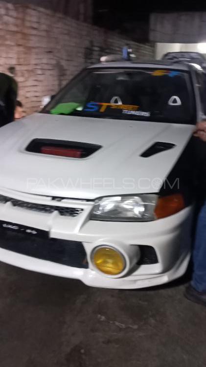 Mitsubishi Lancer Evolution X - 2002  Mitsubishi Lancer Evolution X - 2002  Image-3