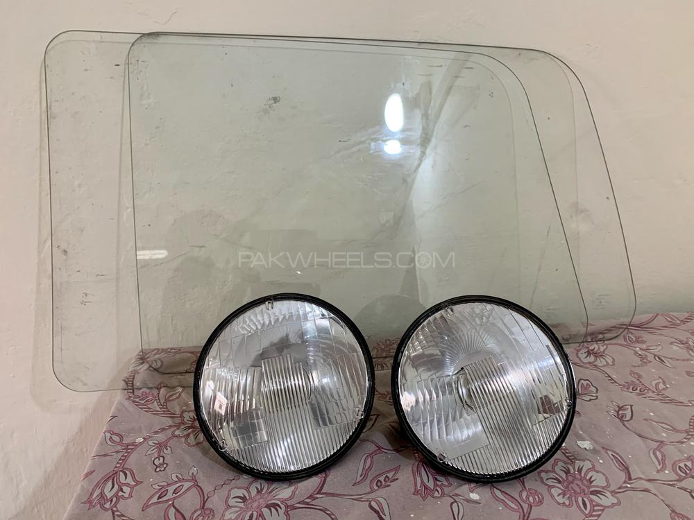 Suzuki Bolan Genuine Windows Glasses & Head Lights Image-1
