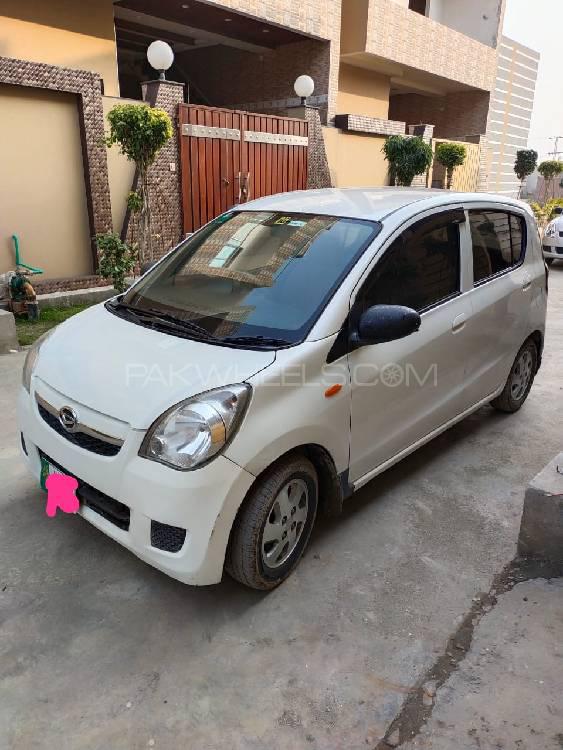 Daihatsu mira 2009 год