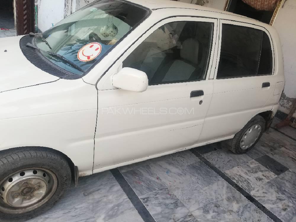 Daihatsu Cuore 2004 for Sale in Lahore Daihatsu Cuore 2004 for Sale in Lahore Image-5