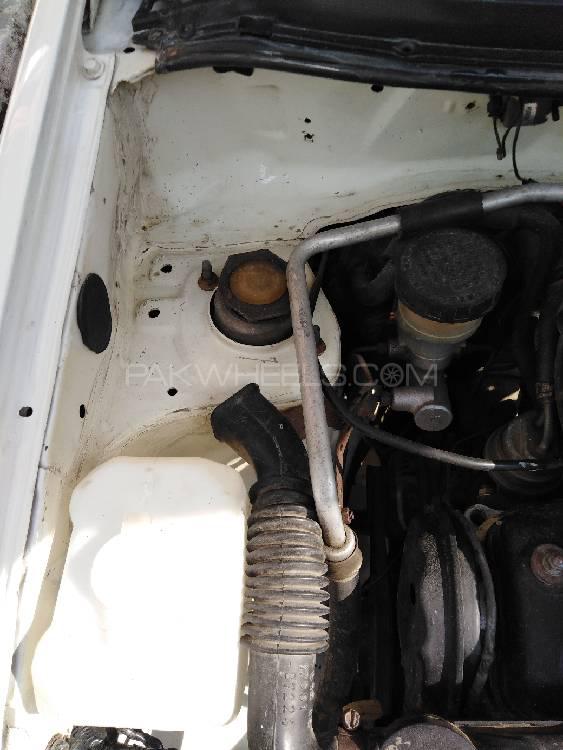 Daihatsu Cuore 2003 for Sale in Mardan Daihatsu Cuore 2003 for Sale in Mardan Image-3