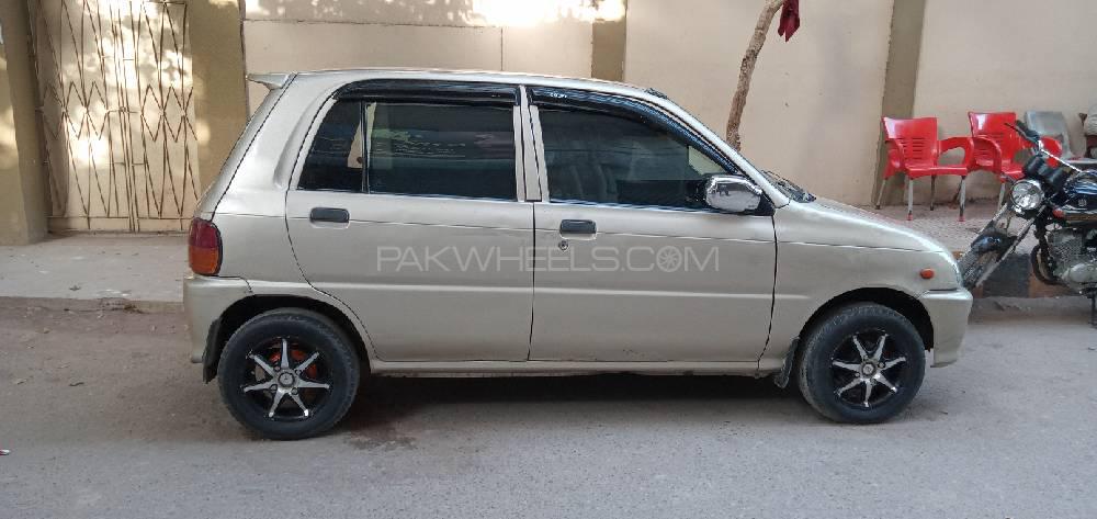 Daihatsu Cuore 2011 for Sale in Karachi Image-1