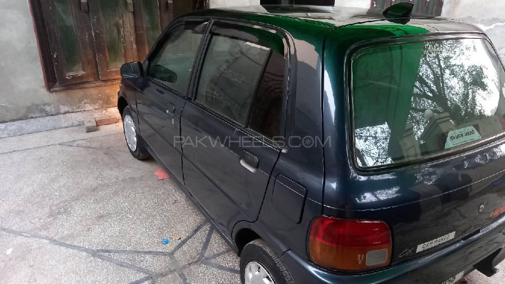 Daihatsu Cuore 2004 for Sale in Faisalabad Daihatsu Cuore 2004 for Sale in Faisalabad Image-4