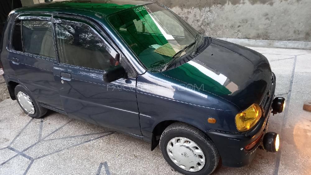 Daihatsu Cuore 2004 for Sale in Faisalabad Daihatsu Cuore 2004 for Sale in Faisalabad Image-3