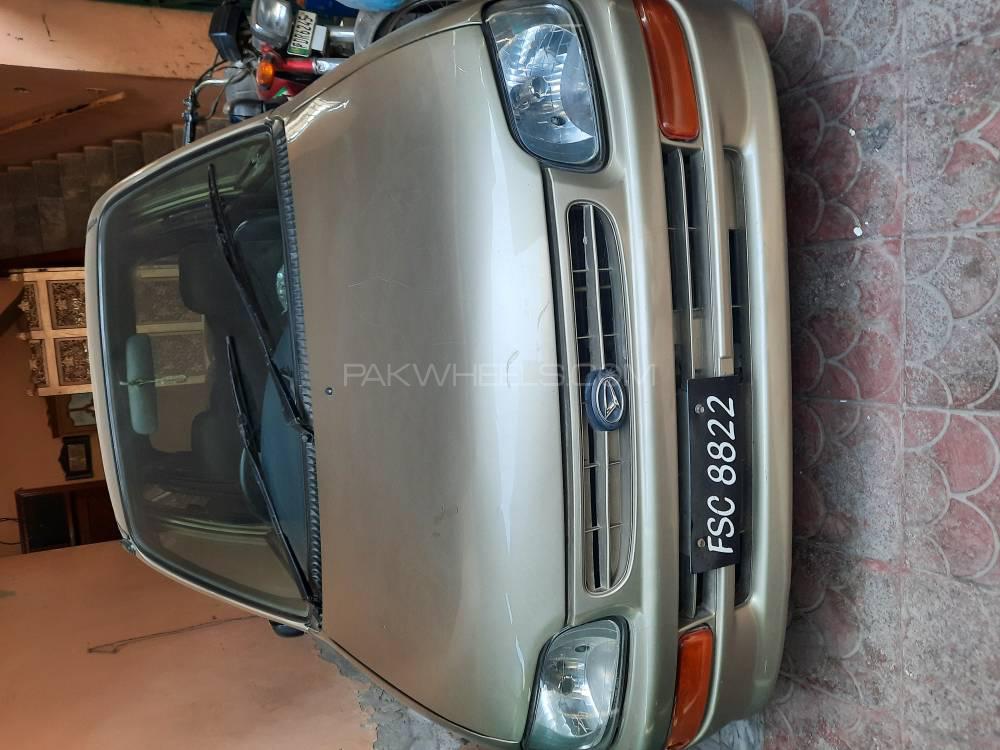 Daihatsu Cuore 2004 for Sale in Faisalabad Image-1