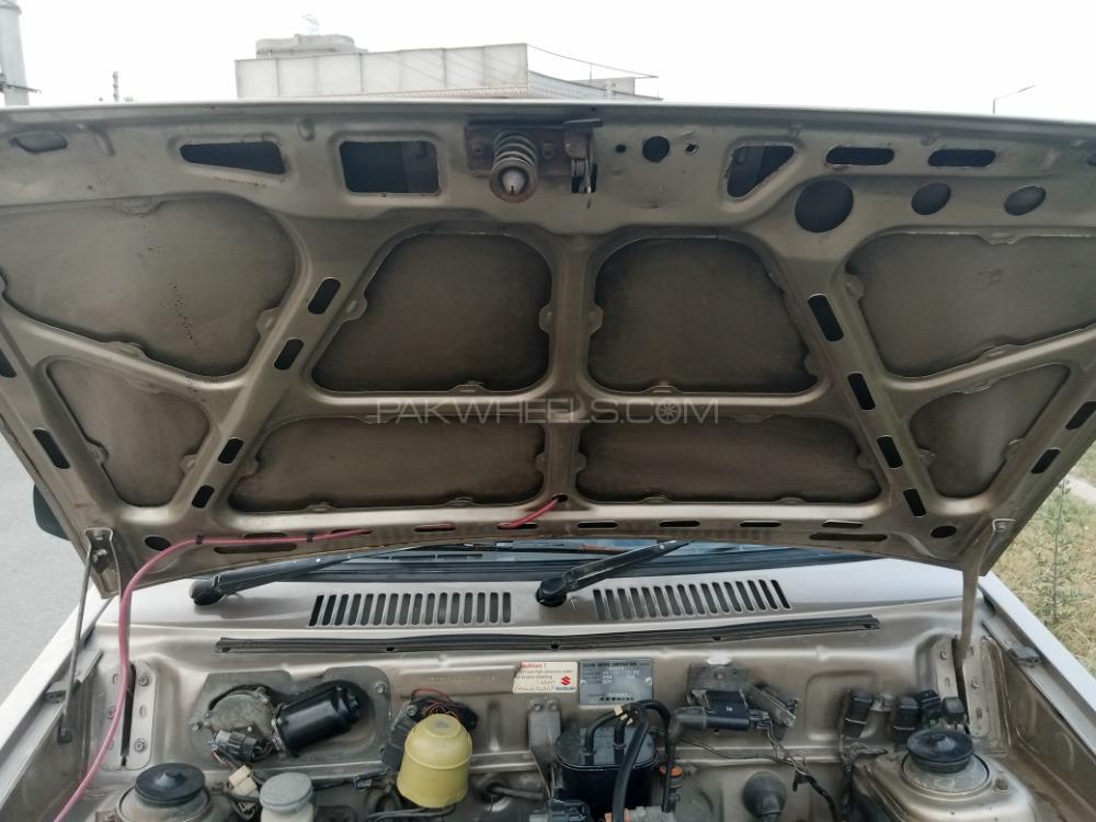 Suzuki Mehran 2014 for Sale in Faisalabad Suzuki Mehran 2014 for Sale in Faisalabad Image-11