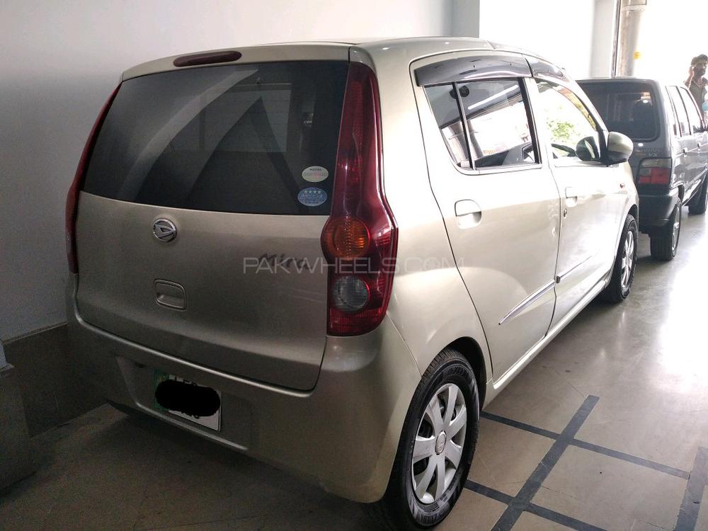 Daihatsu mira 2009 год