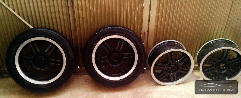 15 inch rims with two tyres Image-1
