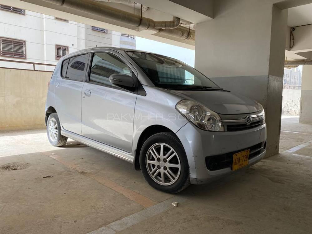 Daihatsu mira 2009 год