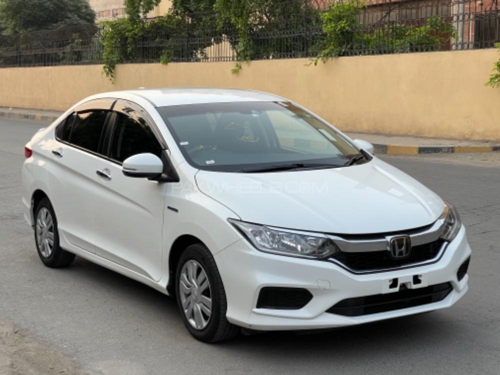 Honda Grace Hybrid DX 2018 for sale in Faisalabad | PakWheels