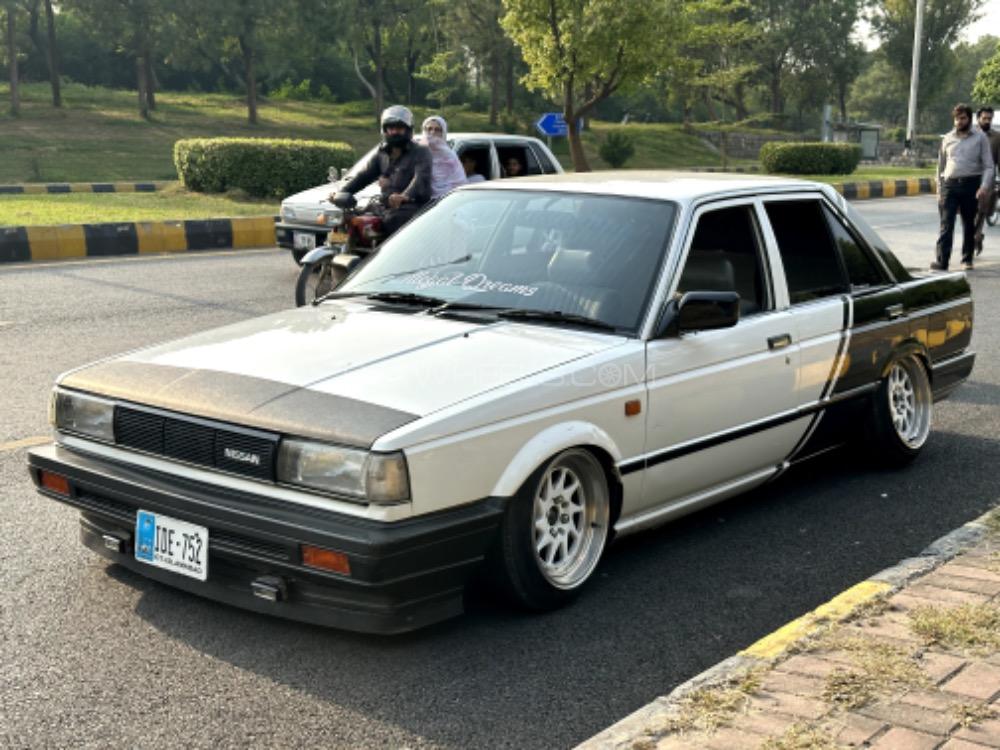 نسان سنی - 1988  نسان سنی - 1988  Image-1