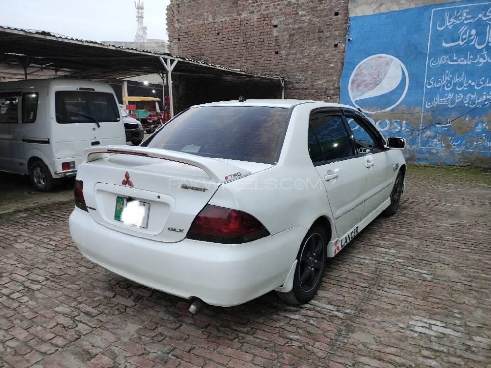 مٹسوبیشی لینسر - 2004  مٹسوبیشی لینسر - 2004  Image-5