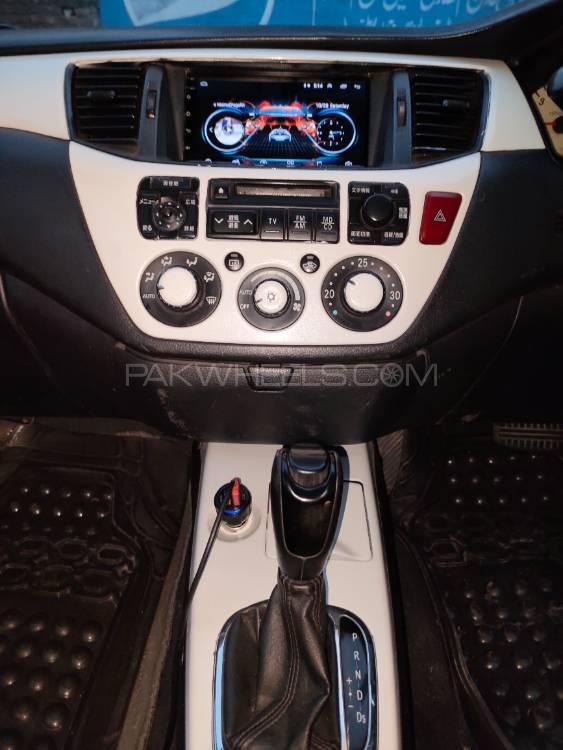 مٹسوبیشی لینسر - 2004  مٹسوبیشی لینسر - 2004  Image-11