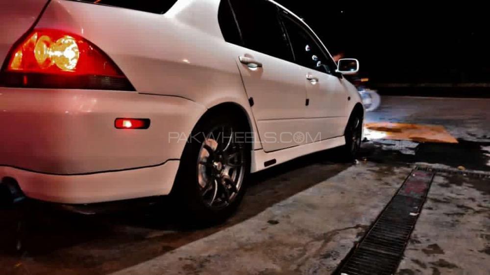 مٹسوبیشی لینسر - 2006  مٹسوبیشی لینسر - 2006  Image-6