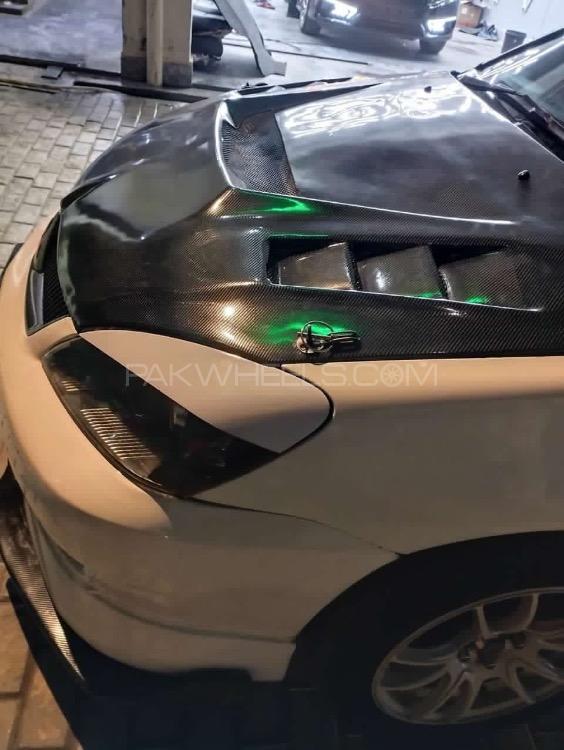 مٹسوبیشی لینسر - 2006  مٹسوبیشی لینسر - 2006  Image-4