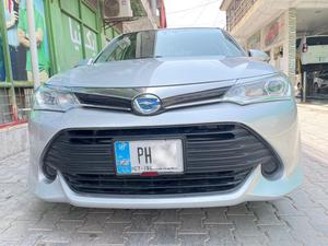 Toyota Corolla Axio Hybrid 1.5 2015 for Sale in Sargodha