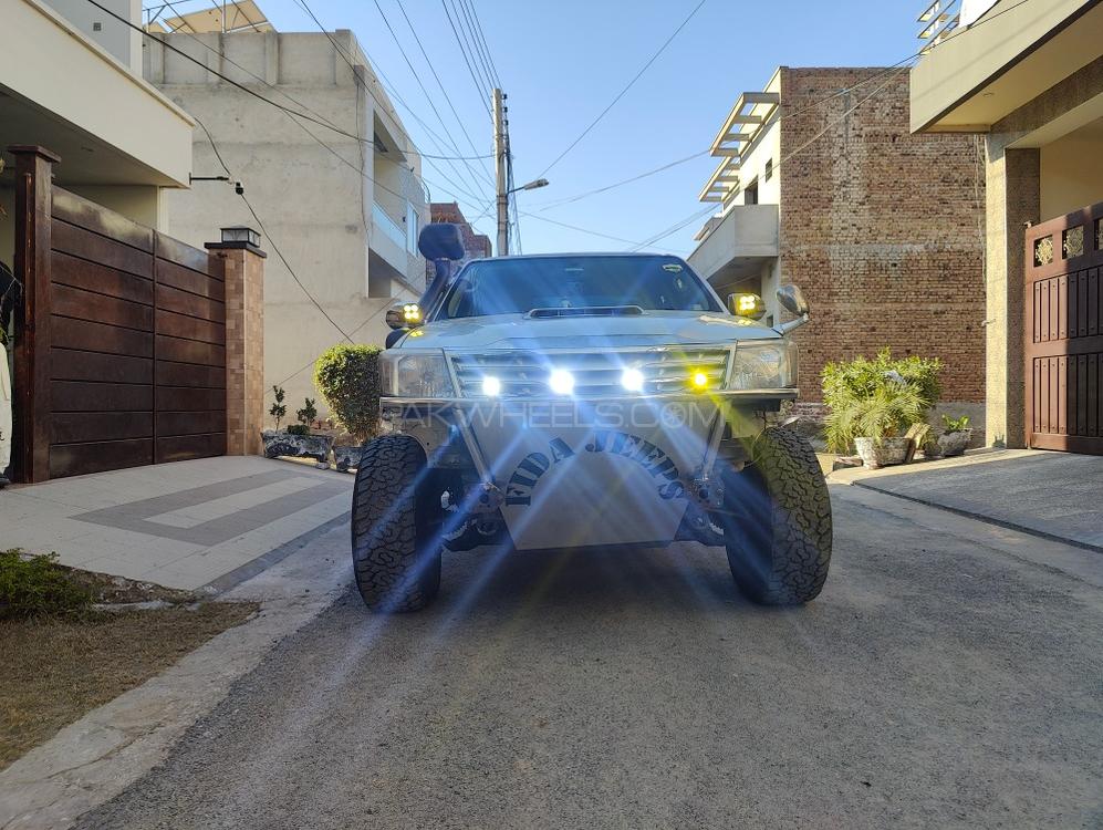ٹویوٹا ہائیلکس - 2005 Booster Image-1