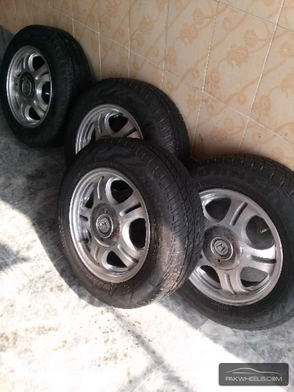 Tyres and  alloy Rims  14 inch 8/10 condition  size 185/65R1 Image-1