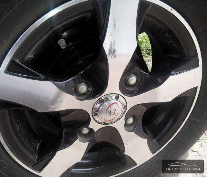 Tyres rimz for mehran good condition size 12 Image-1