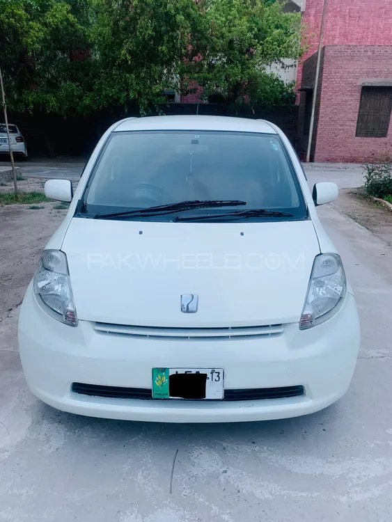 Toyota Passo 2013 for Sale in Faisalabad Image-1