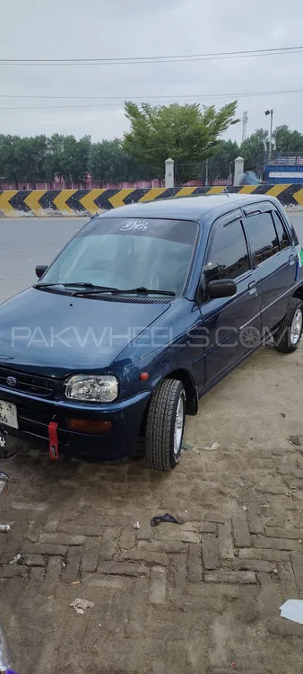 Daihatsu Cuore 2012 for Sale in Faisalabad Image-1