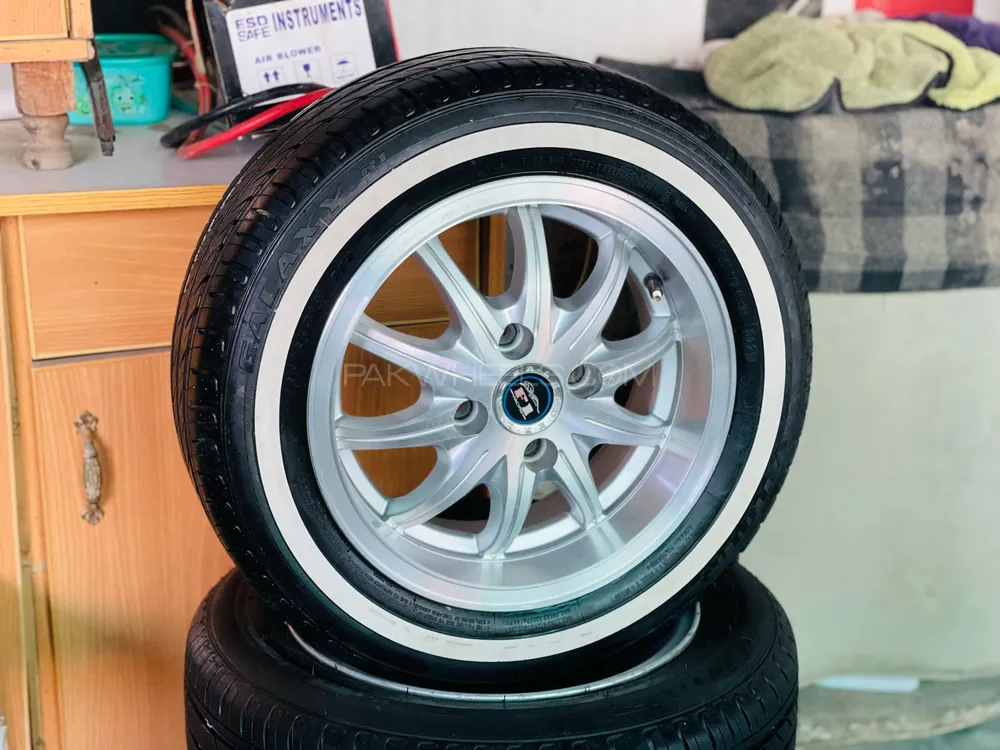 brand new alloyrims with new patti tyres, 165/65 R13 few months used Image-1