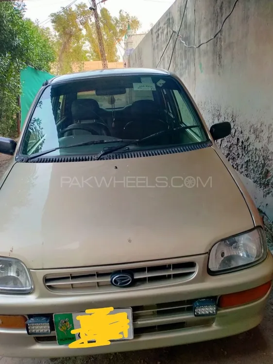 Daihatsu Cuore 2010 for Sale in Faisalabad Image-1