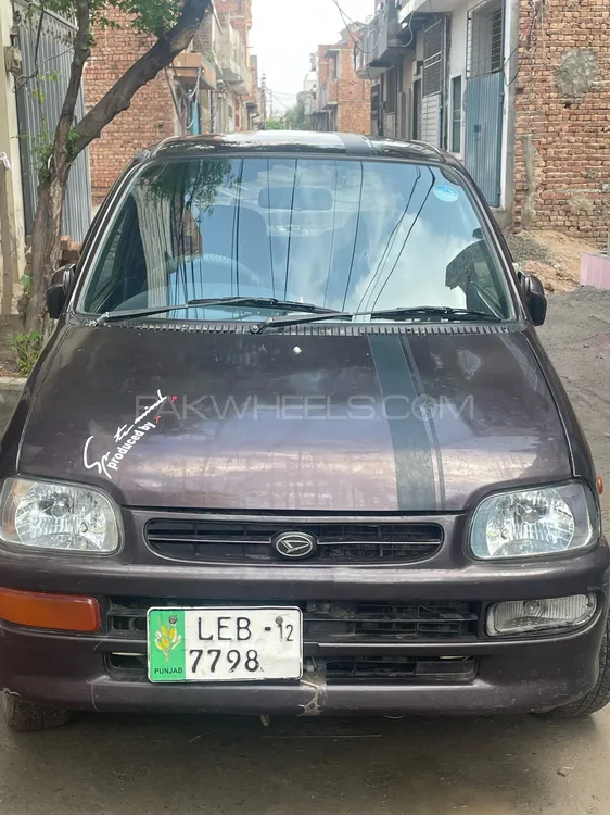 Daihatsu Cuore 2012 for Sale in Faisalabad Image-1