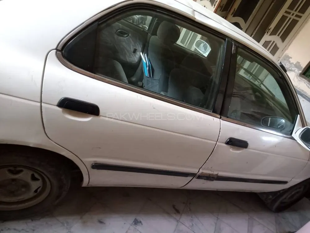Suzuki Baleno 2004 for Sale in Faisalabad Image-1
