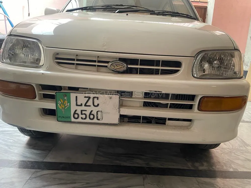 Daihatsu Cuore 2004 for Sale in Faisalabad Image-1