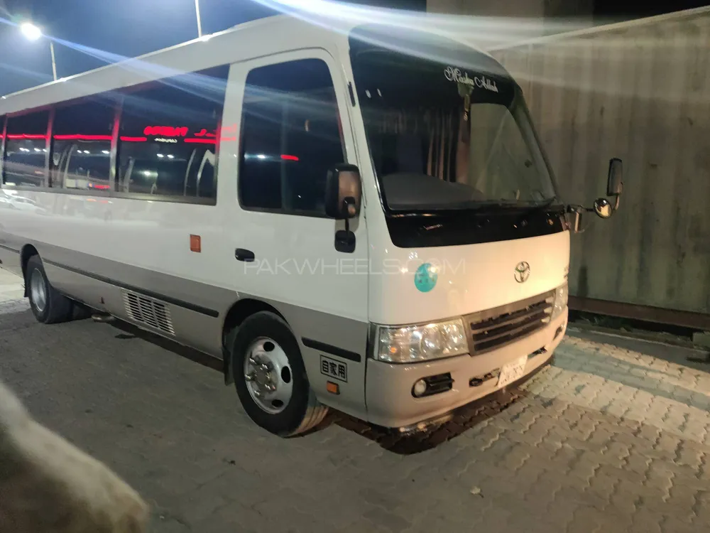 Toyota Coaster 29 Seater F L 2022 for sale in Faisalabad PakWheels