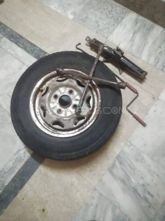 Spare Tyre R13" Rim Fitted with jack pana Image-1