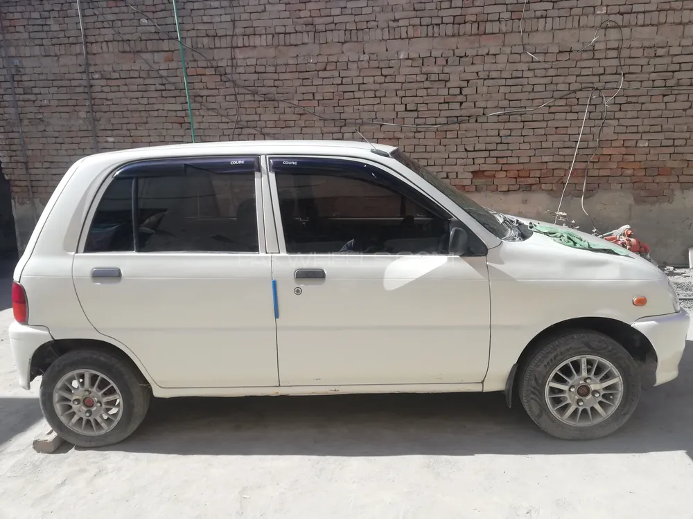 Daihatsu Cuore 2011 for sale in Muzaffar Gargh