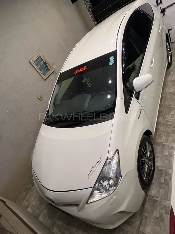 Toyota Prius Alpha 2014 for Sale in Faisalabad Image-1